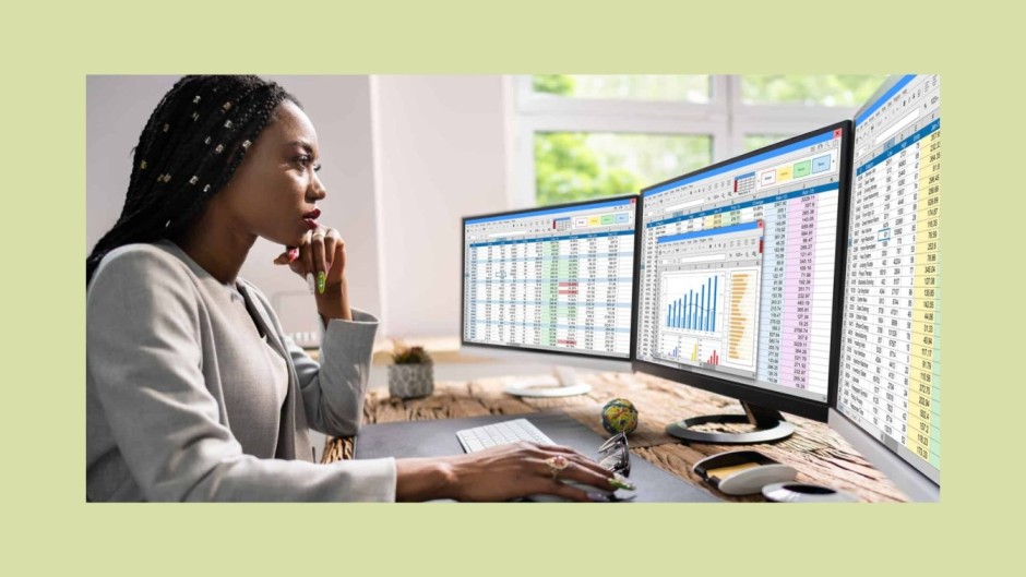 a woman in front of a power bi dashboard